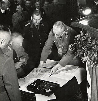 Unterzeichnung der Eingemeindungsverträge der Stadt Durlach und der Gemeinde Hagsfeld in die Stadt Karlsruhe am 1. April 1938 durch Oberbürgermeisters Adolf Friedrich Jäger im Bürgersaal, 1. April 1938